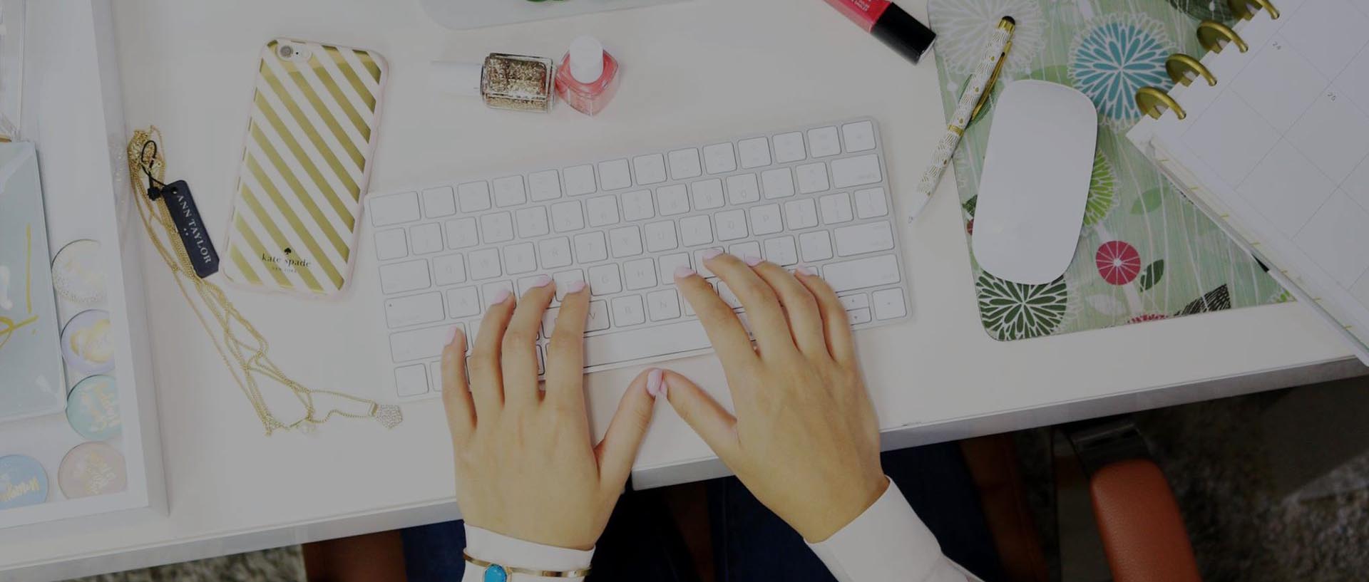 Hands typing in a keyboard